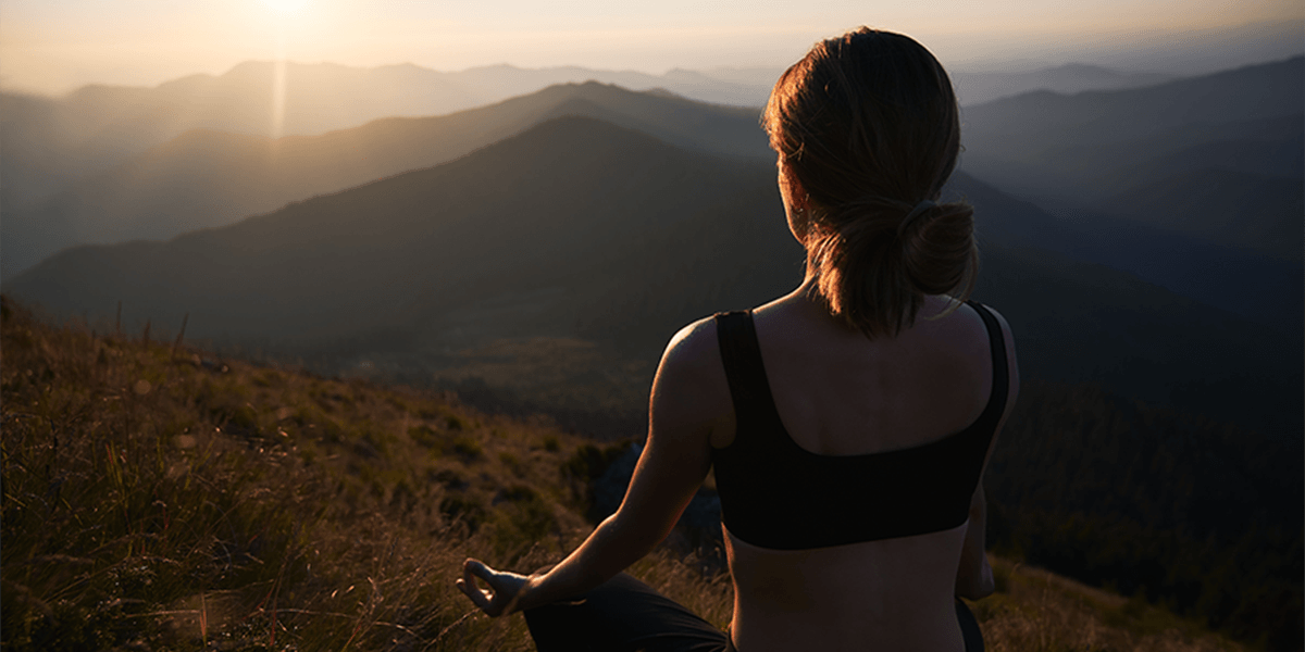 slender-woman-doing-yoga-fresh-air (1)